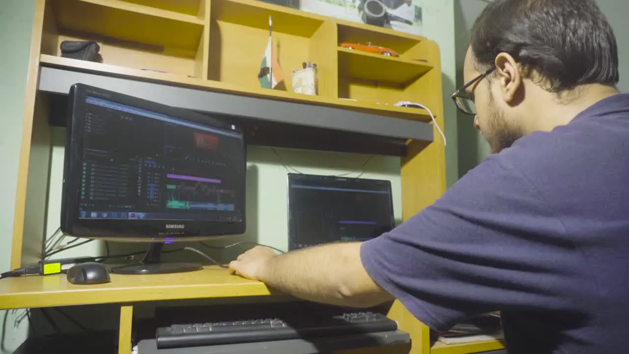 Filmmaker editing on his desk