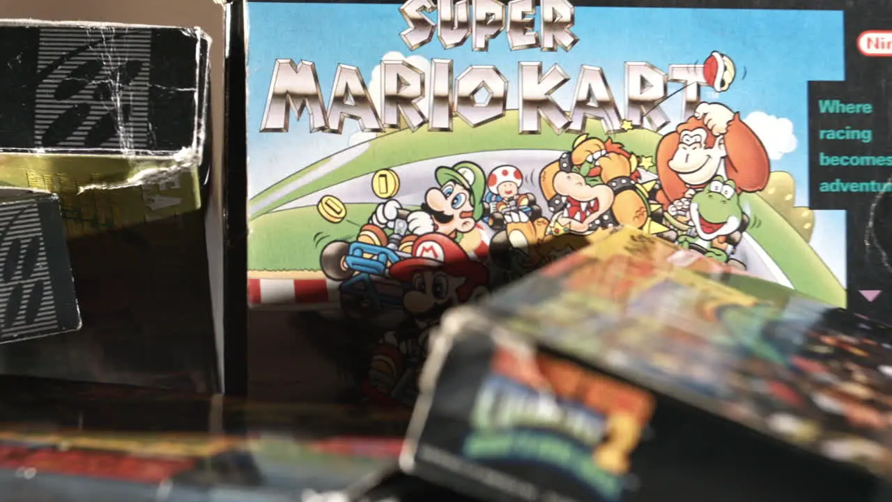 Vintage Super Mario Kart Box with Other Games Surrounding SLIDE RIGHT