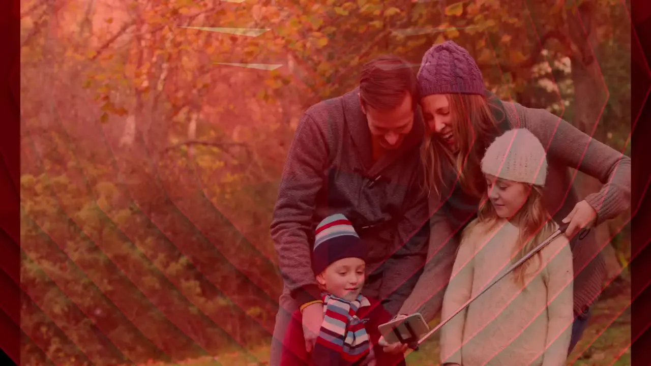 Animation of red heart shape over caucasian family outside