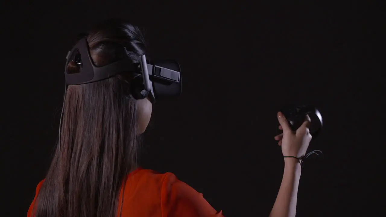 Lady Gesturing in a Virtual Reality Headset