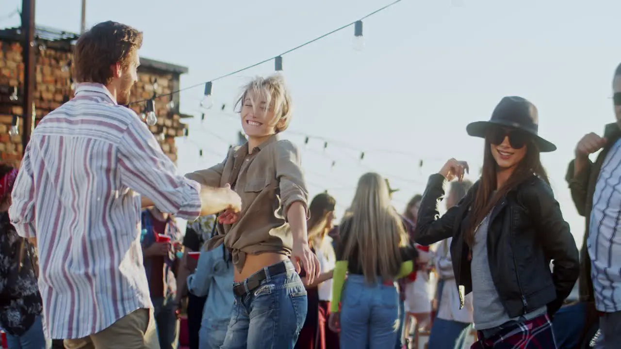 Happy Young Group Of Friends Dancing And Having Fun At The Daytime Rooftop Party Outdoor 1