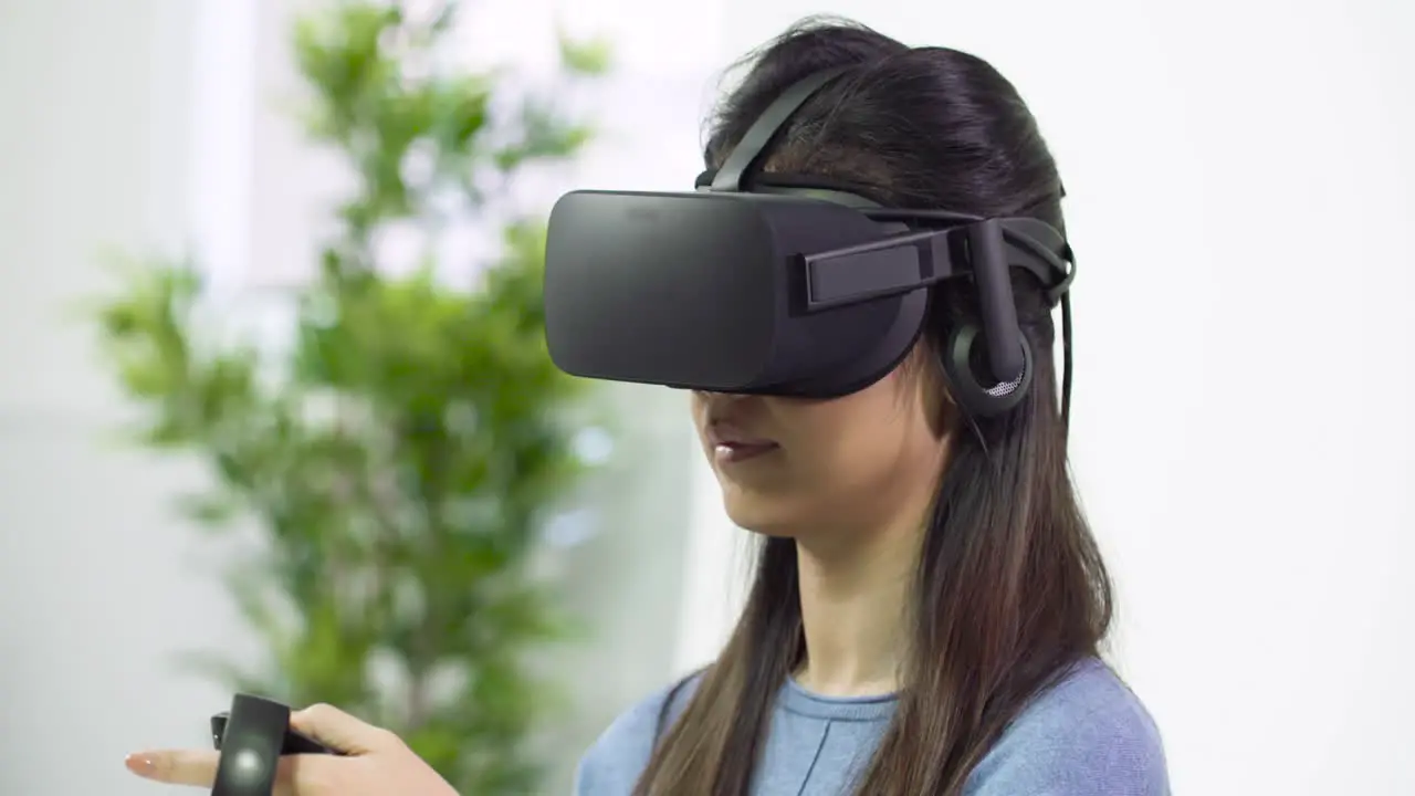 Young Lady Looking Around in VR Headset