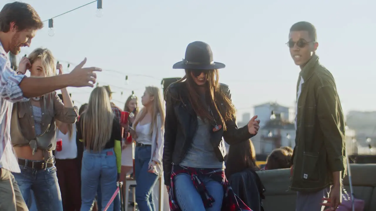 Happy Young Group Of Friends Dancing And Having Fun At The Daytime Rooftop Party Outdoor 2