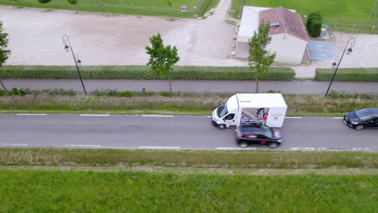 Van driving on the highway transporting goods