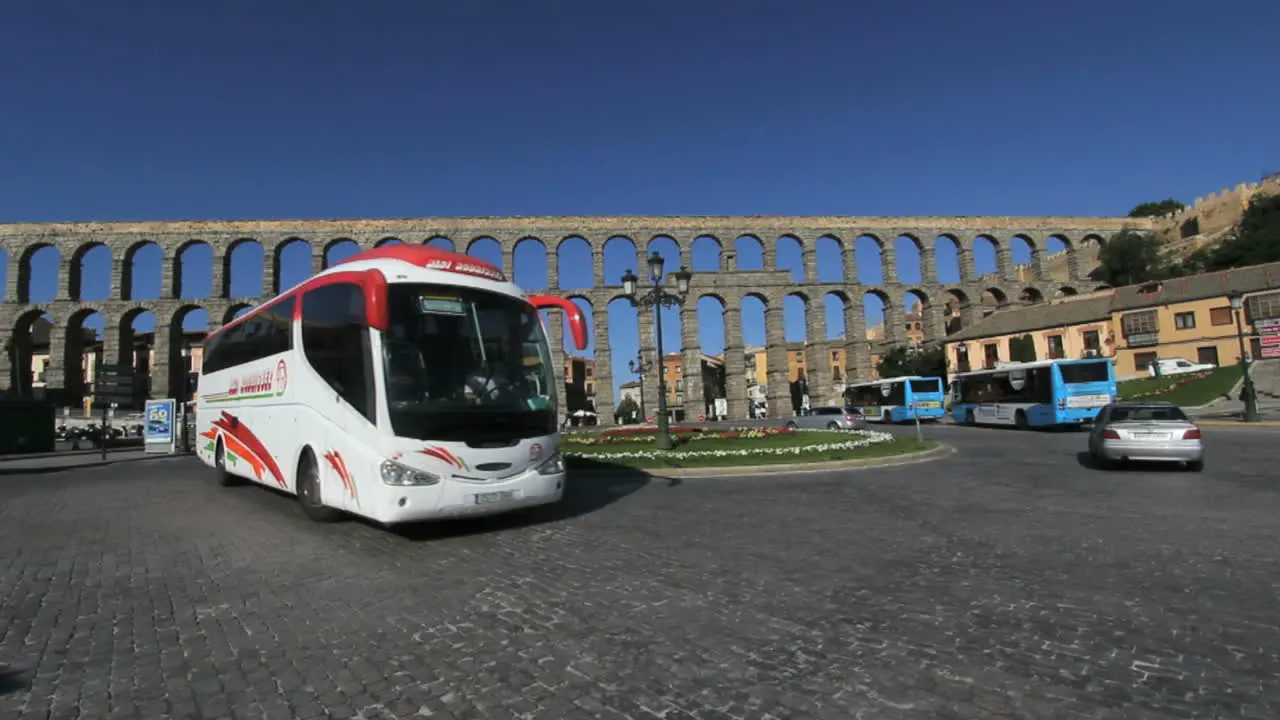 Segovia aquaduct morning traffic circle time-lapse