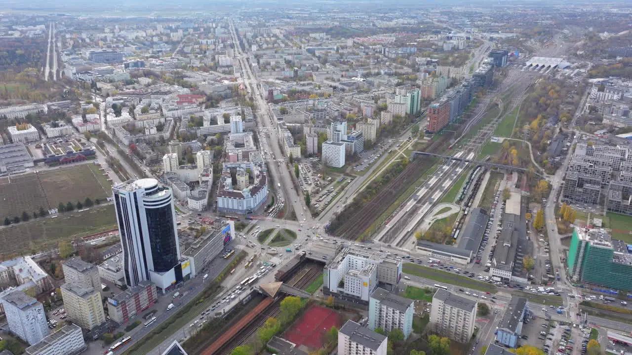 Pan down aerial shot over Artur Zawisza Square Warsaw Poland