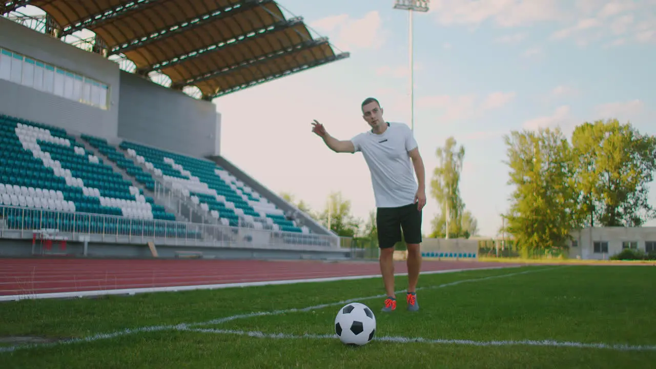 Soccer player performs outstanding play during a soccer game on a professional outdoor soccer stadium Player wears unbranded uniform Stadium and