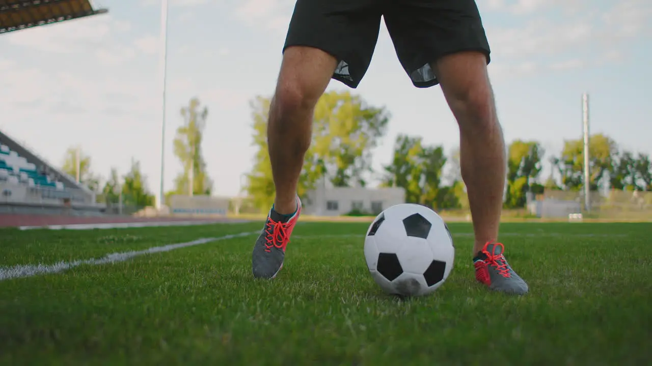 soccer player show footwork and Soccer player kicking and Shooting ball on goal in slow motion