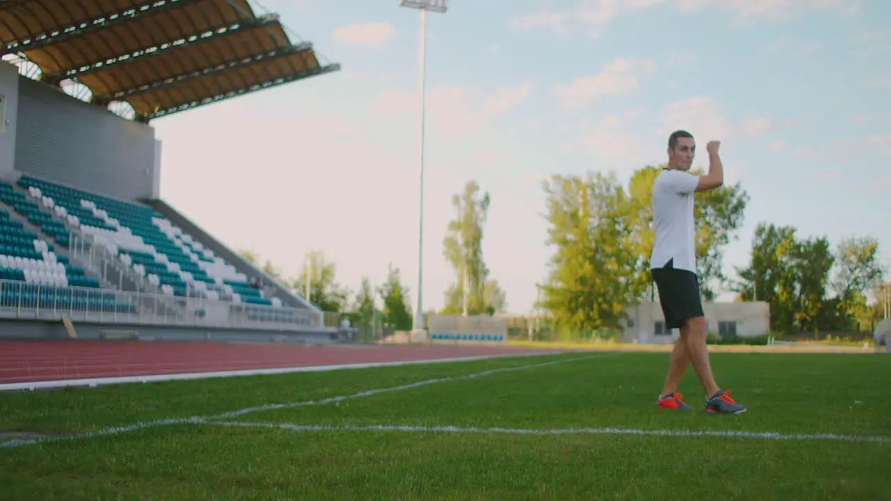 Soccer player performs outstanding play during a soccer game on a professional outdoor soccer stadium Player wears unbranded uniform Stadium and crowd