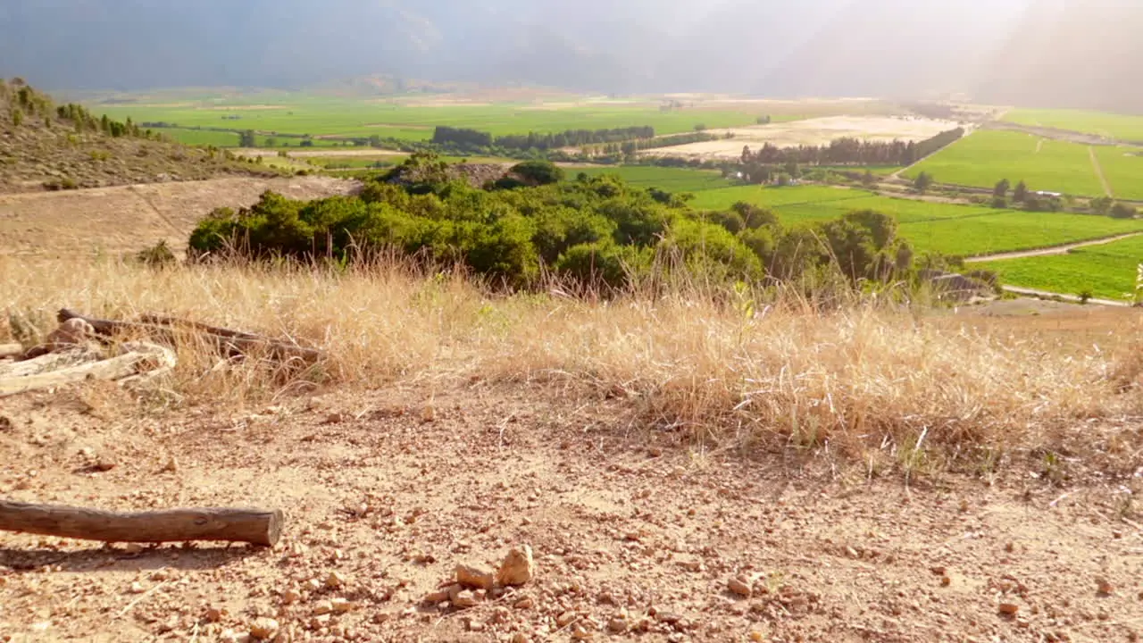 cropped footage of a mountain bike passing through a valley