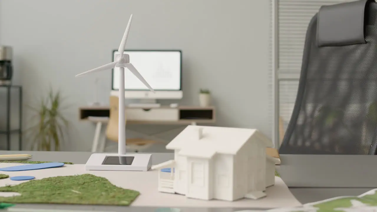 Wind Turbine Miniature And House Model On Office Table 2