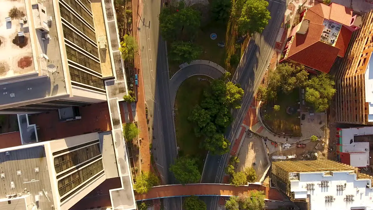 Cinematic downward angle drone shot of streets in downtown Tucson Arizona