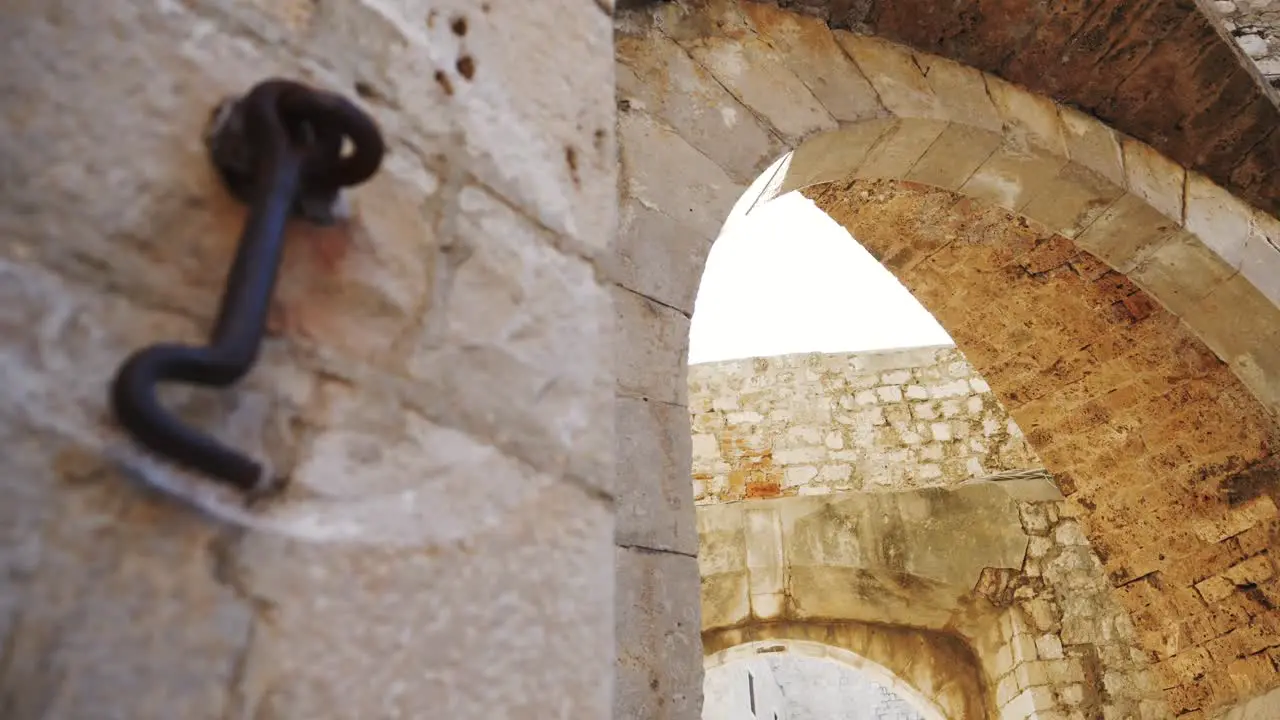 Dubrovnik atmospheric street and walls of the old town with a gate