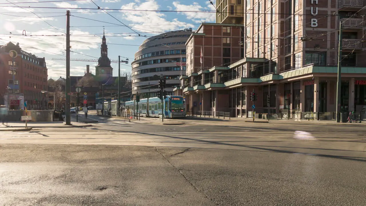 Time lapse of downtown Oslo zoom out Oslo S traffic passing by