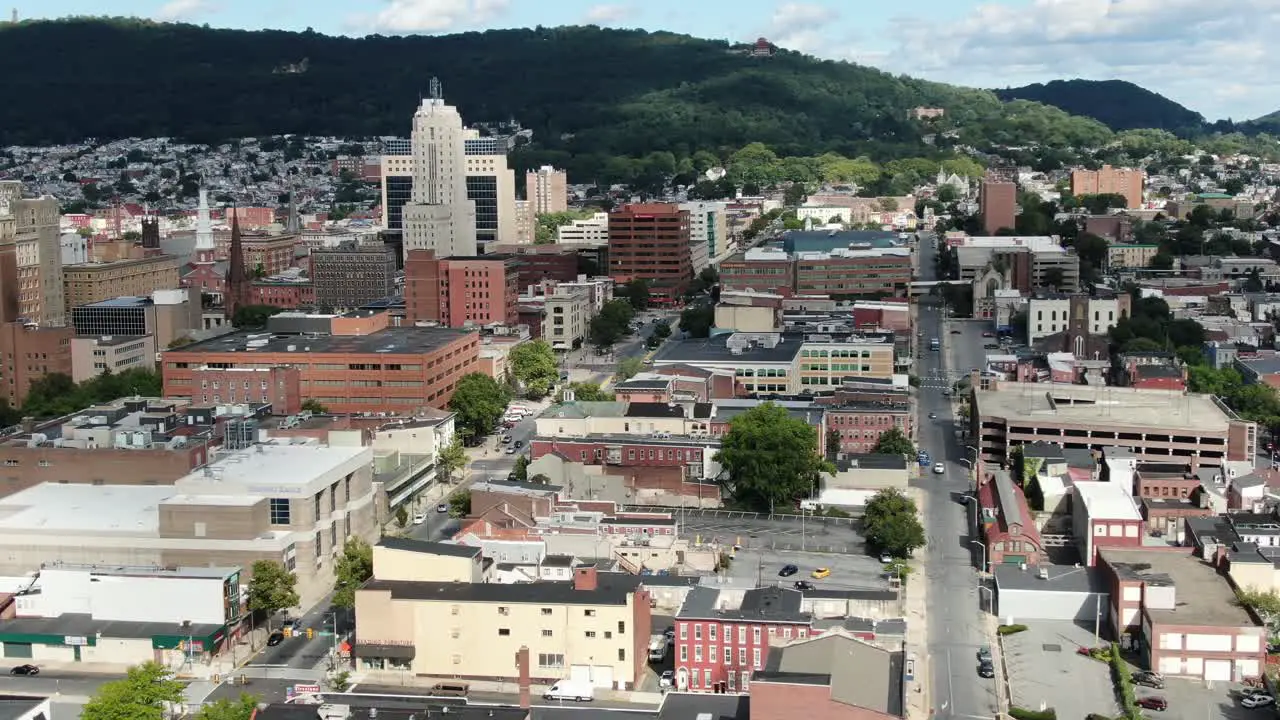 Aerial Reading Pennsylvania downtown city district Berks County outside Philadelphia establishing shot during summer