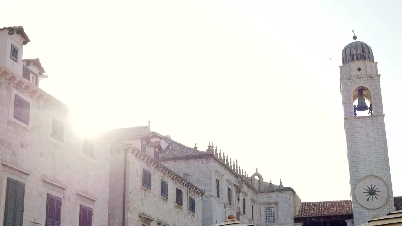 Dubrovnik morning sun illuminating the walls of the old city and the clock tower