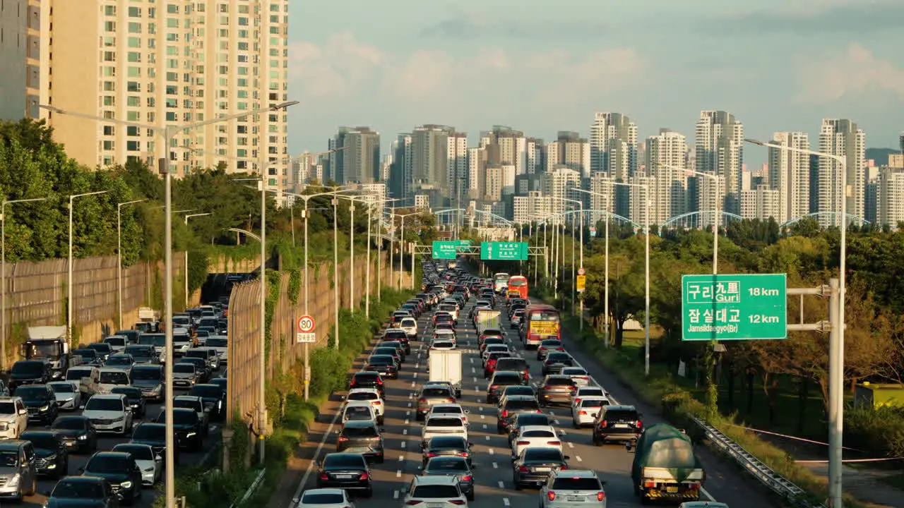 Commuters Stuck in Slow Moving Traffic After Work During Rush Hour in Seoul South Korea