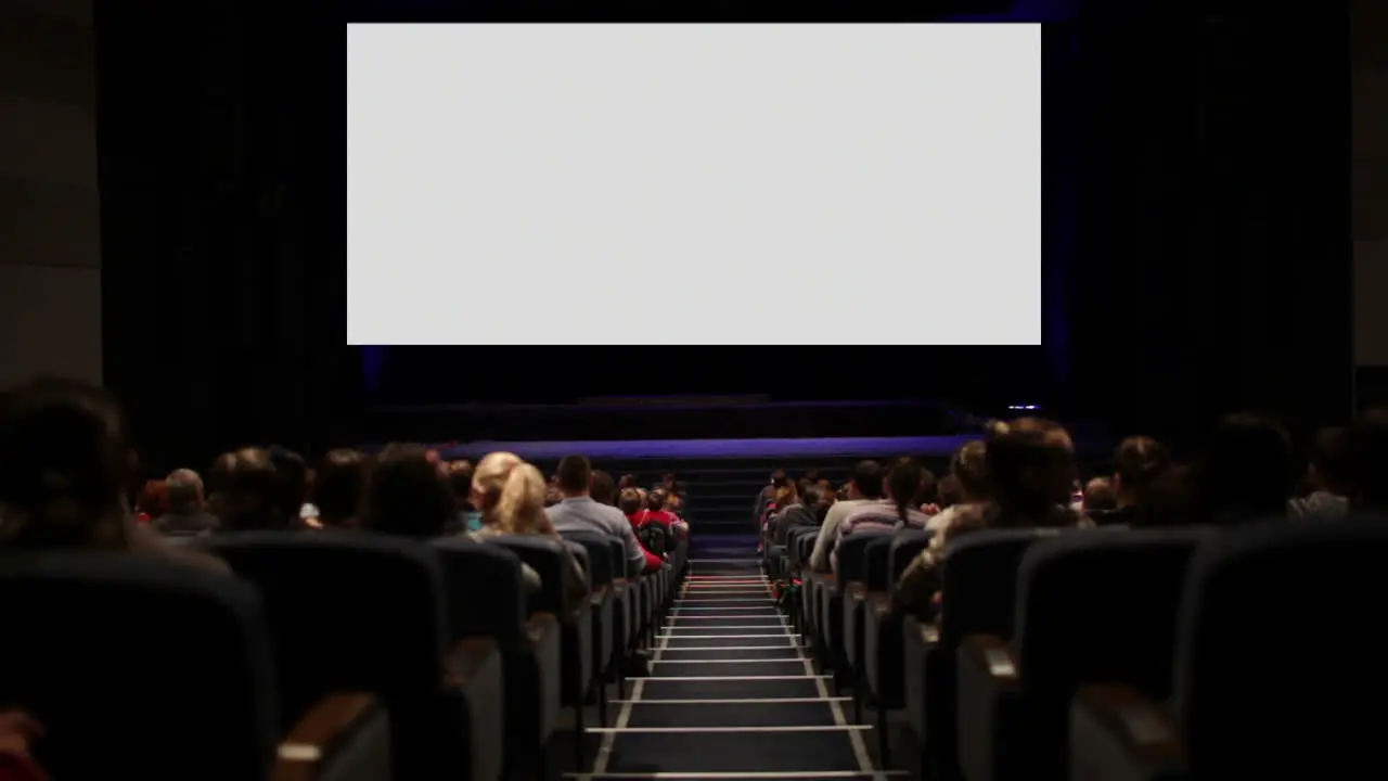 Viewers in the cinema house Variant with screen motion