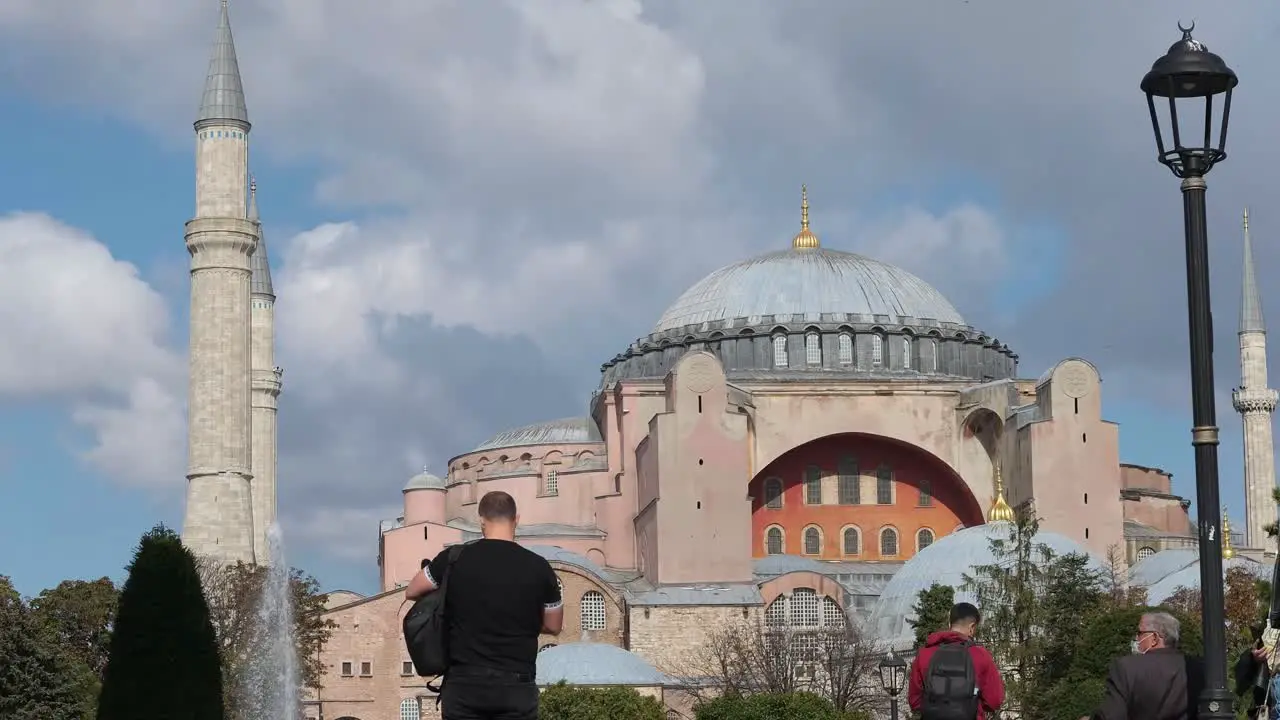 Low Angle Time Lapse Shot of People Walking Outside Hagia Sophia