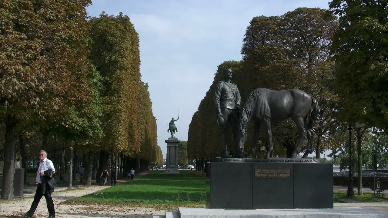 Paris statues and mall with man