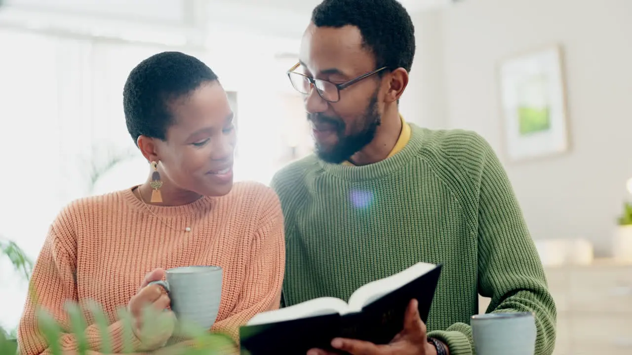 Home smile and black couple reading a bible