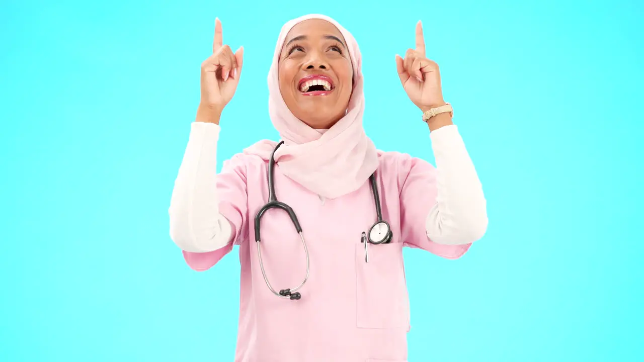 Muslim nurse happy woman and pointing finger