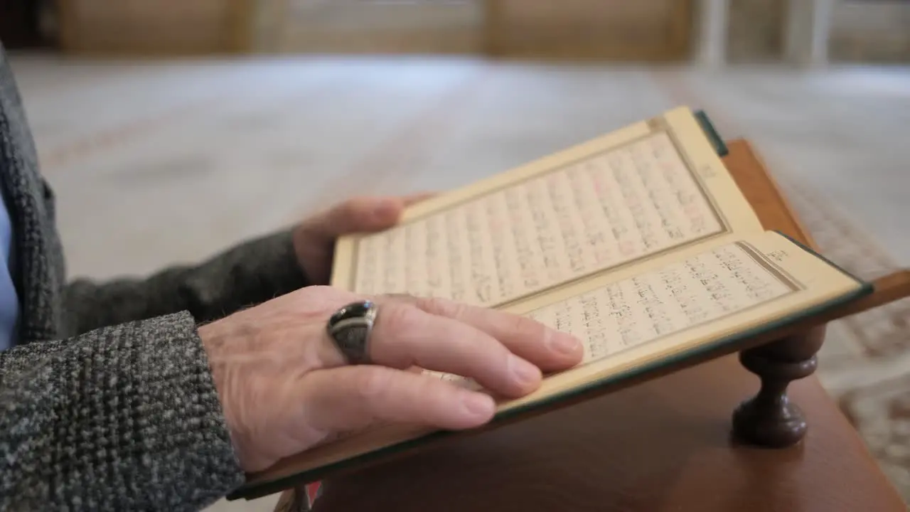 Hands and arabic quran