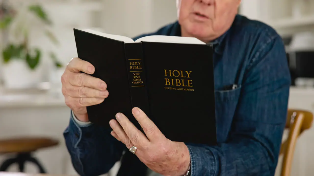 Senior man hands and bible study with reading