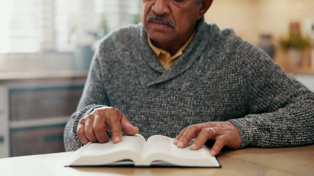 Elderly man reading and bible study in home