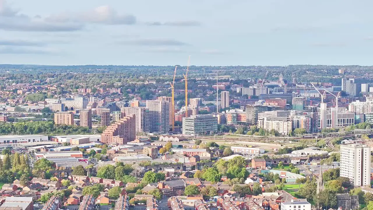 Wide angle drone shot urban city landscape in England on sunny day