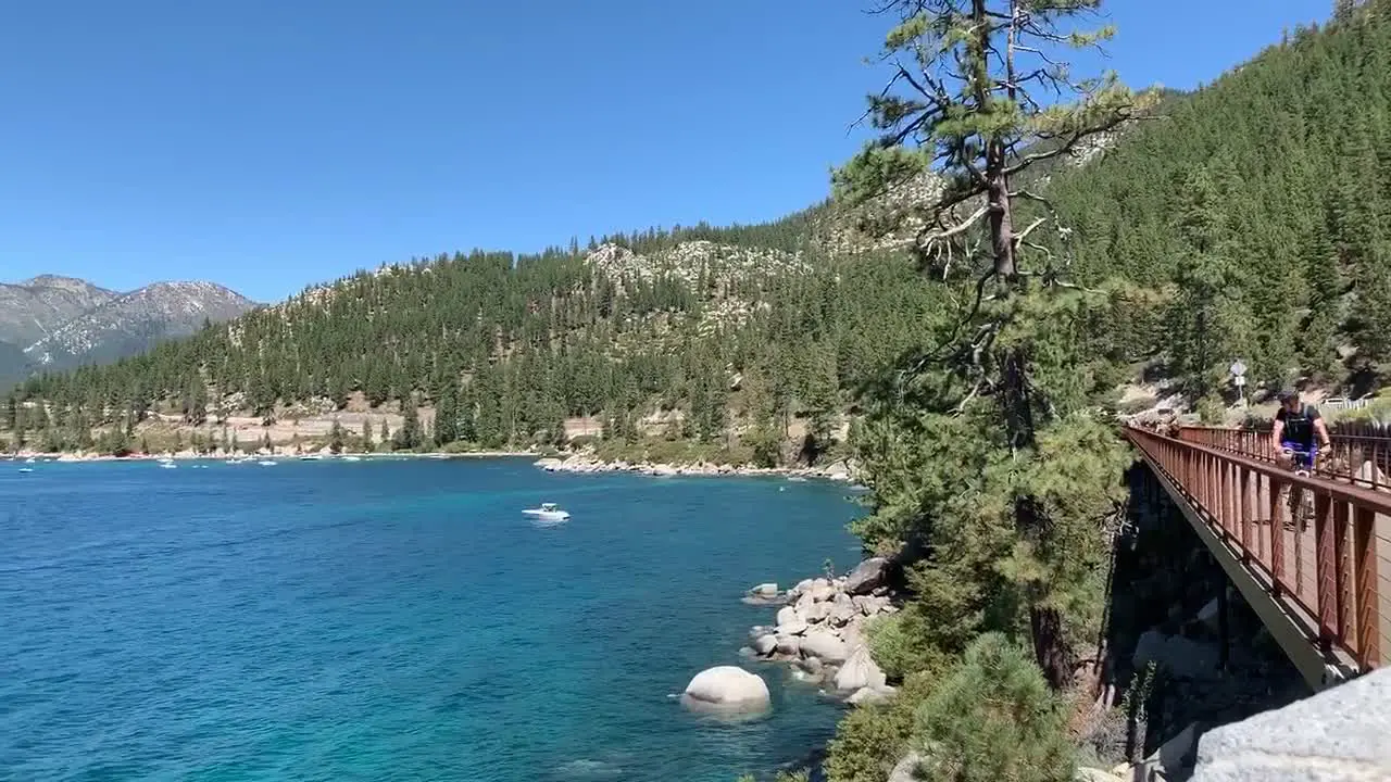 Bike riders enjoying the beautiful summer weather and scenery in Lake Tahoe's new bike-walking trail in East Shore