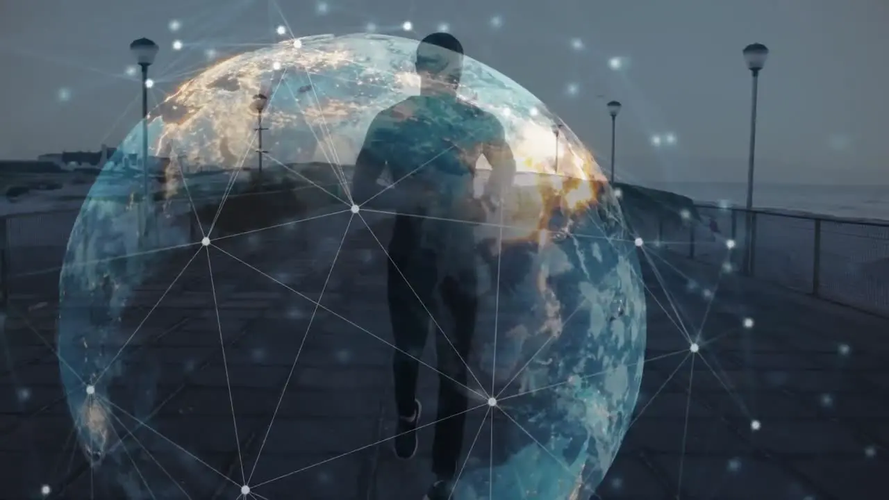 Animation of globe of networks of connections over man running by seaside