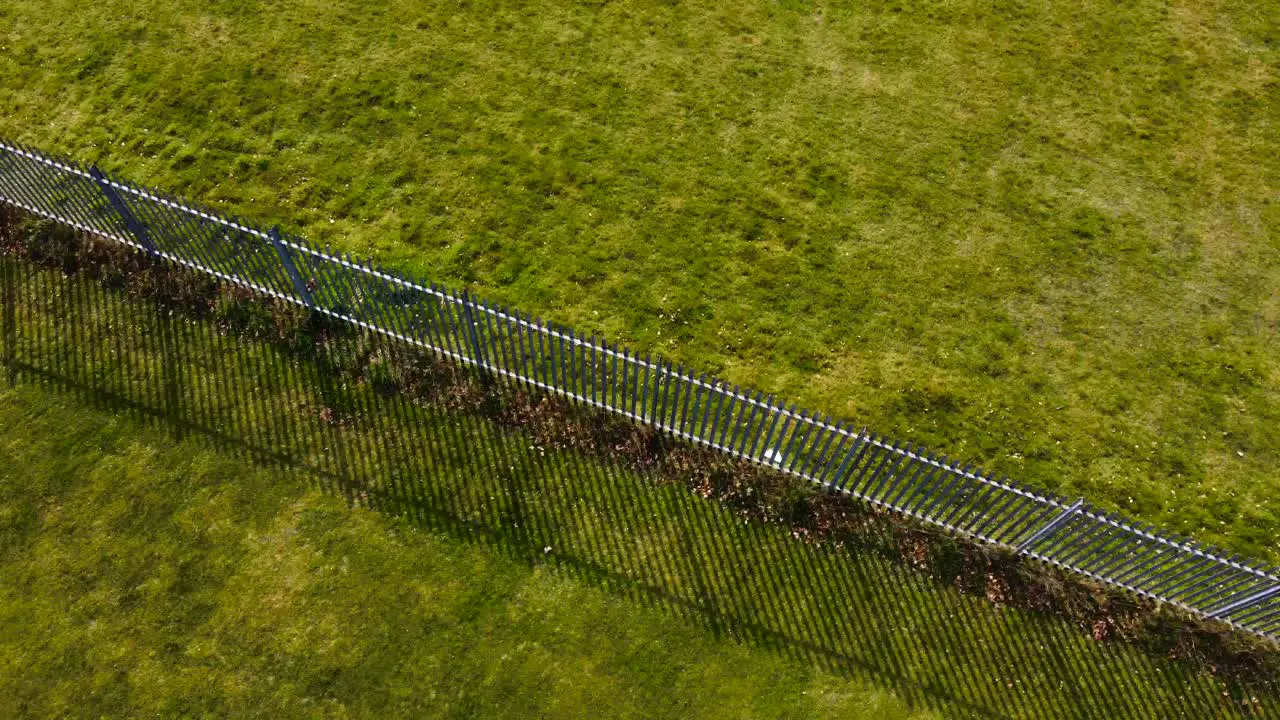 Aerial overview of training workout equiptment at outdoor urban sports ground on a beautiful green sports ground at daytime