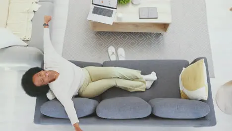 Afro woman stretching after waking up