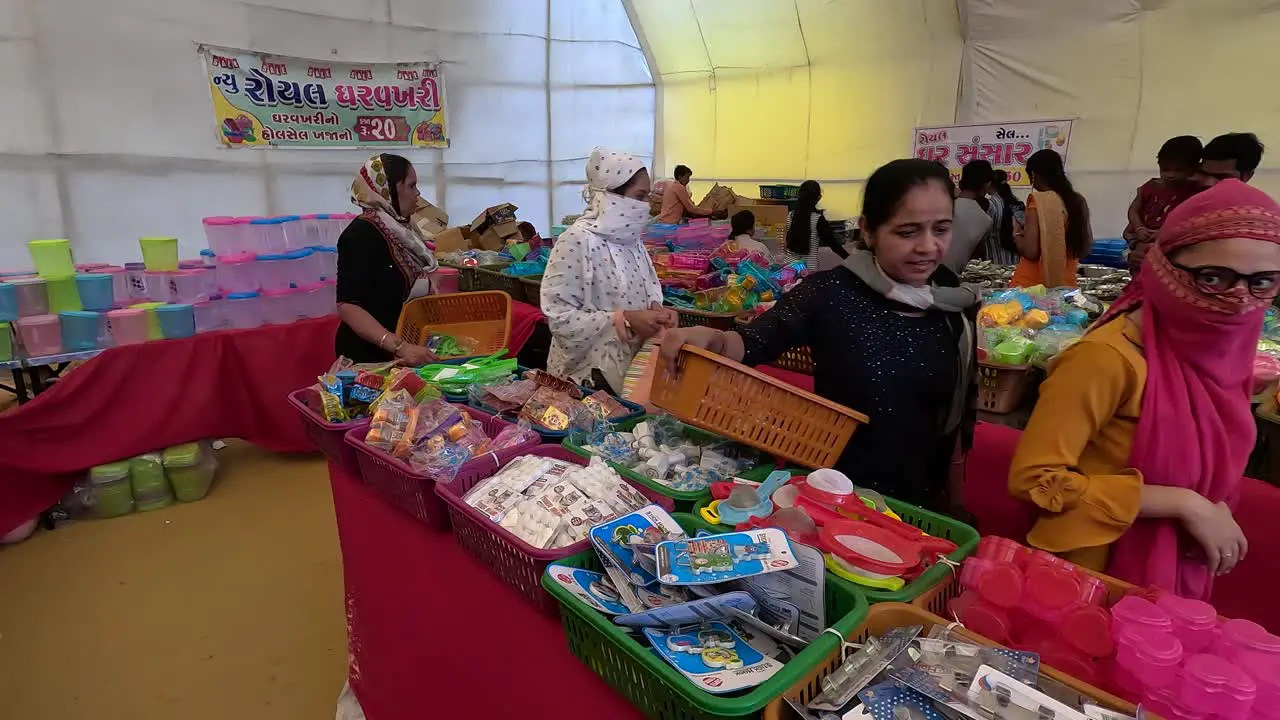 Useful cooking utensils made of wood Women are buying items from the sale