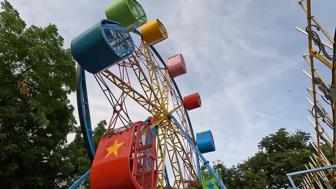 Scene from the colorful merry go round ride of the amusement park