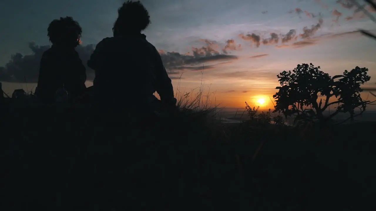 Couple enjoy sunrise in slow motion