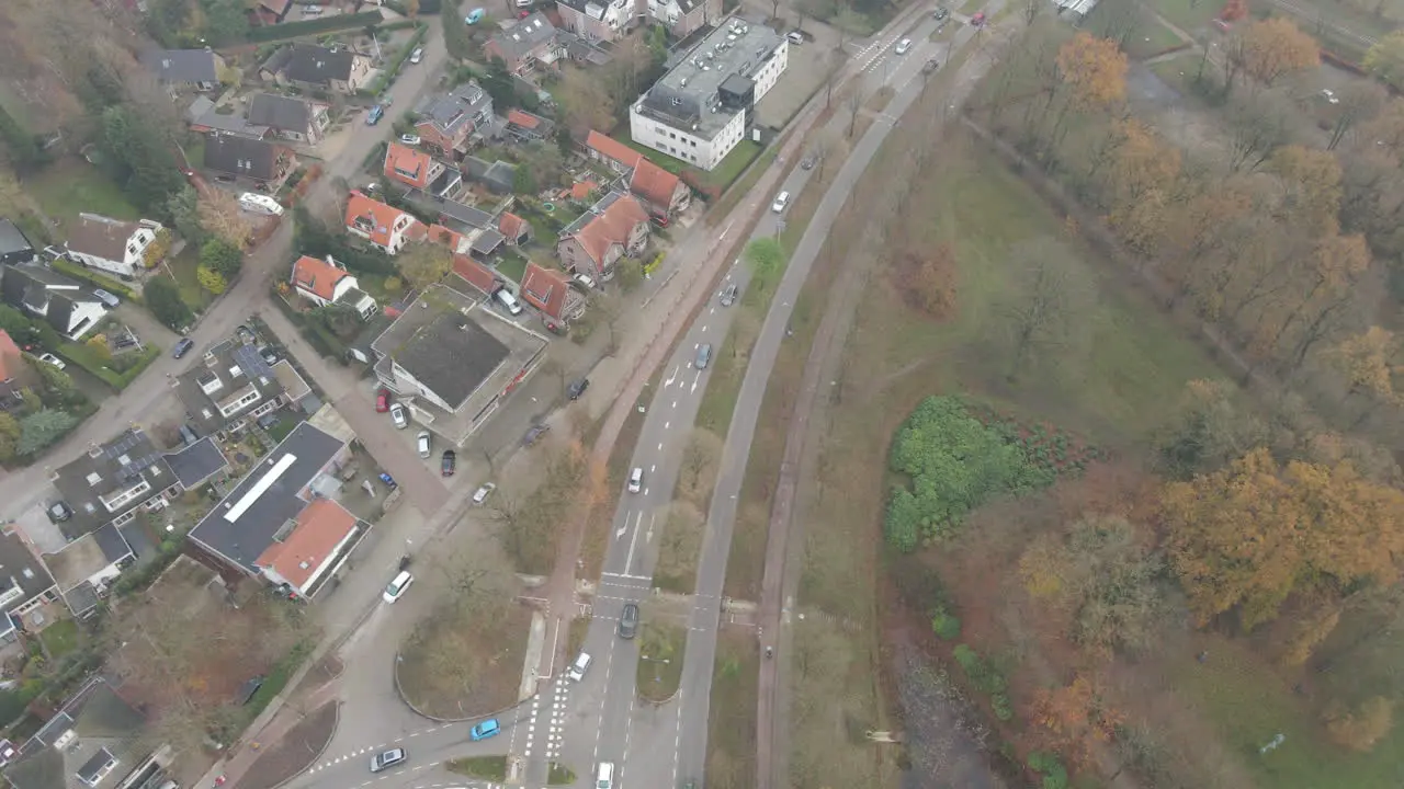 High aerial of traffic driving over busy road