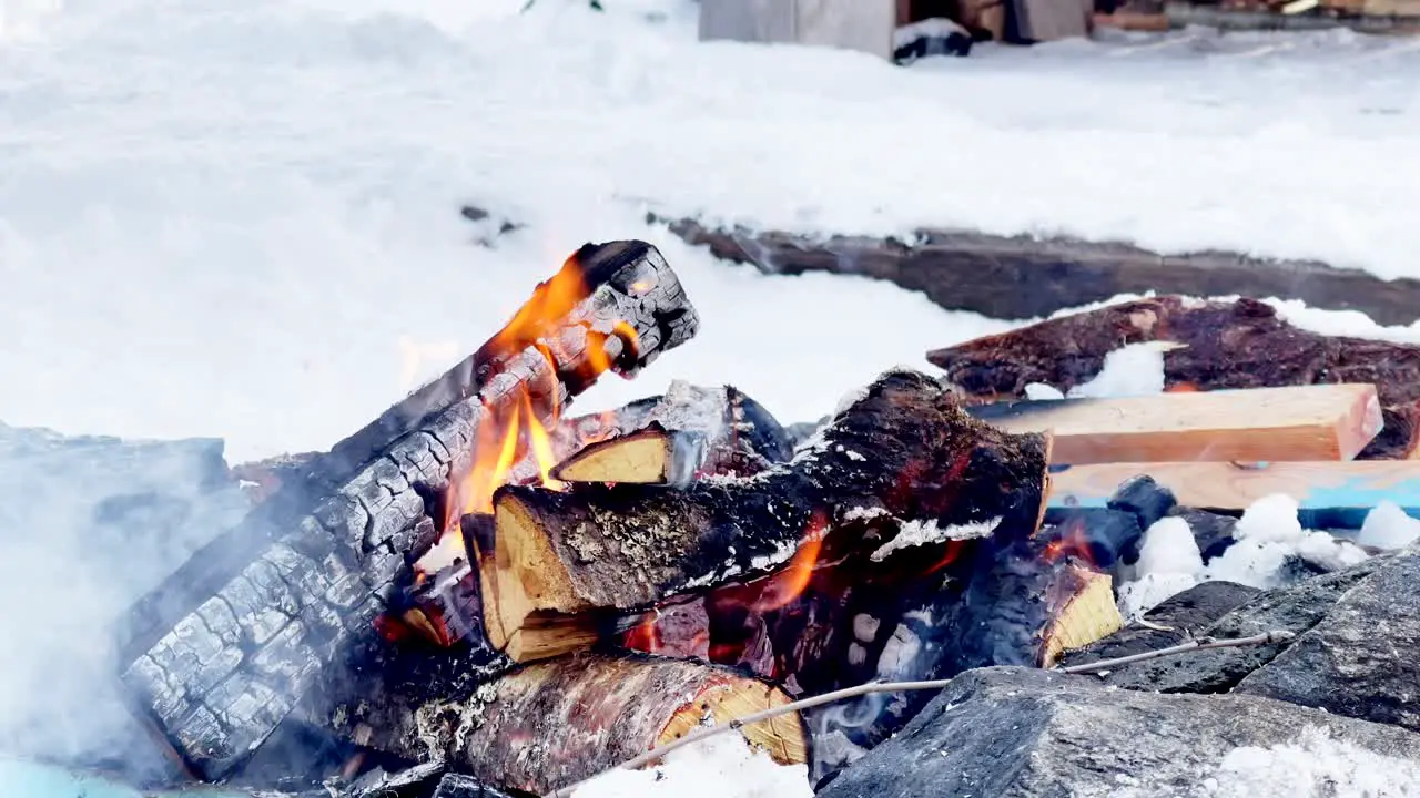 Close-up of cozy bonfire during a ski trip in beautiful Norwegian nature