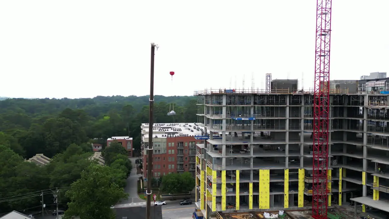 Machinery on construction site of new modern multistorey building