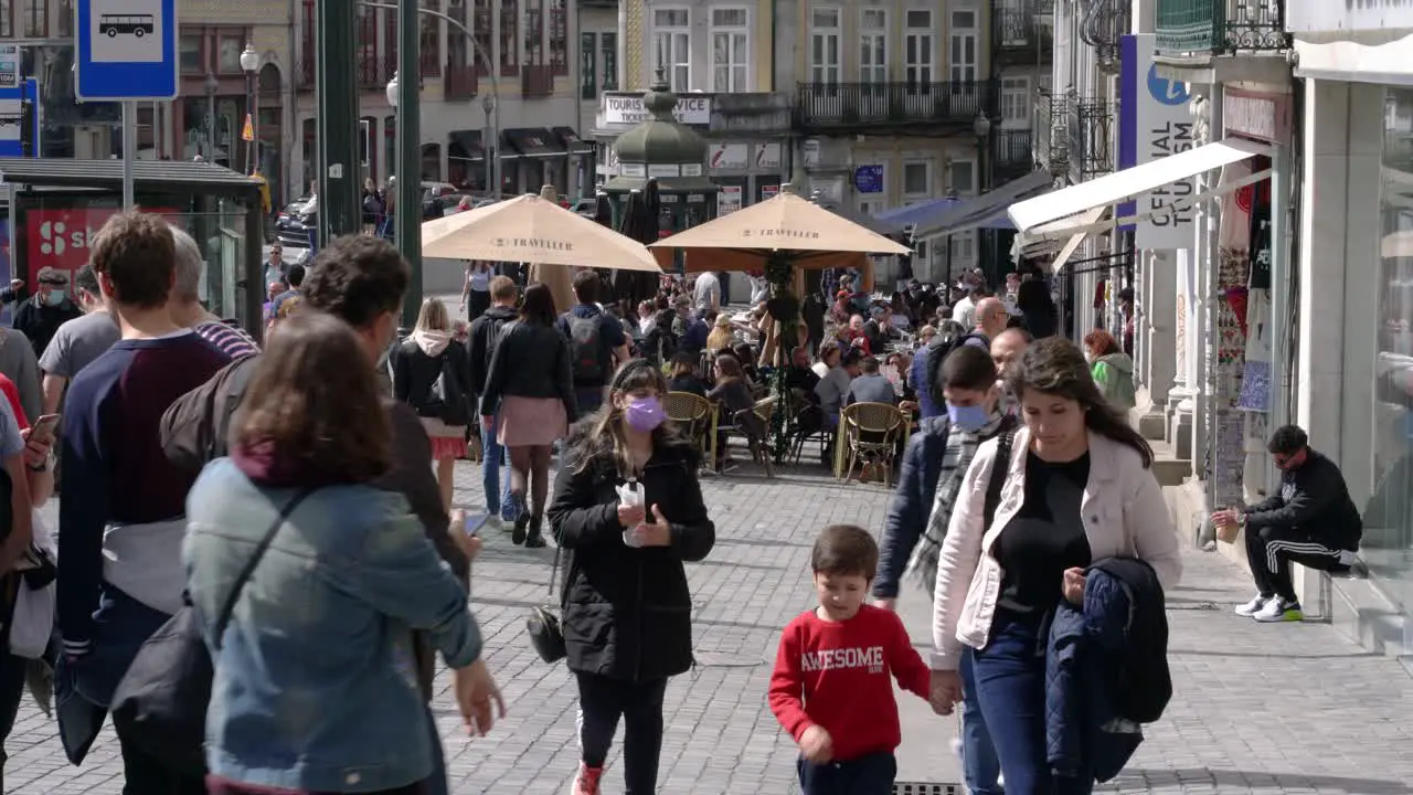 Crowd of tourists near Sao Bento Porto Portugal