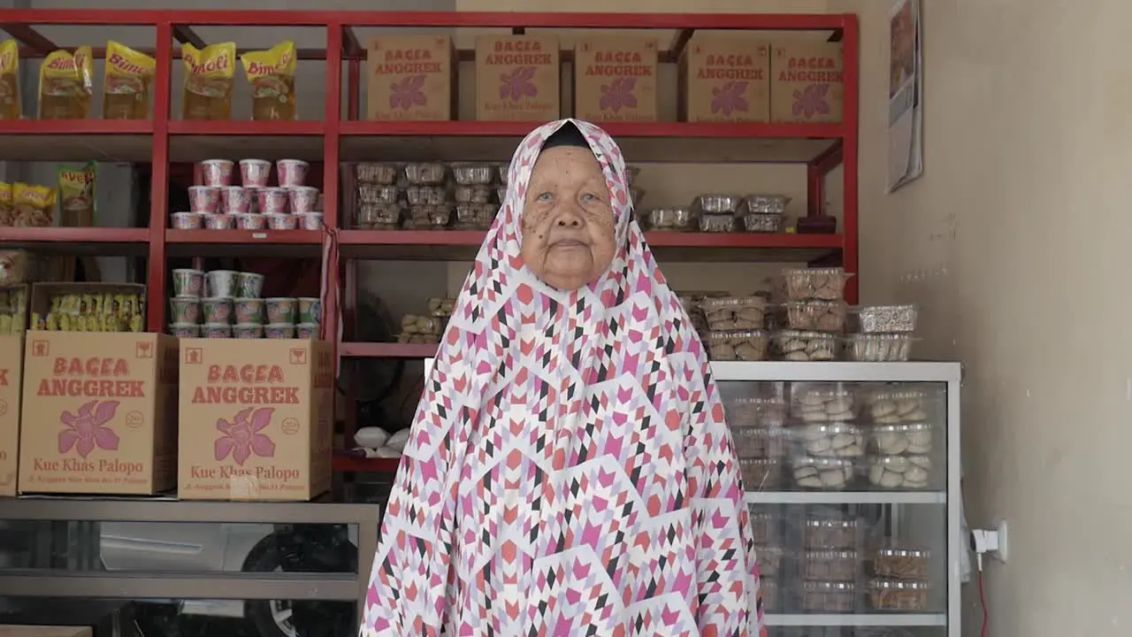 Old Asia Indonesia woman standing