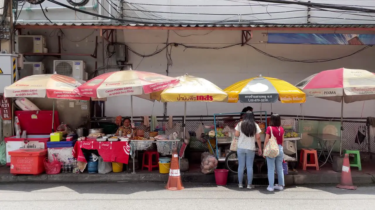 Mobile stalls vendors along Silom  Bangkok