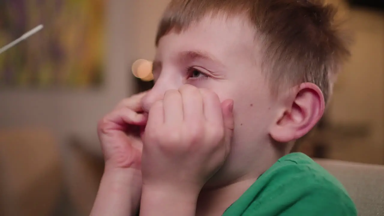 Little boy is scared to get a nasal swab for a covid-19 rapid response test