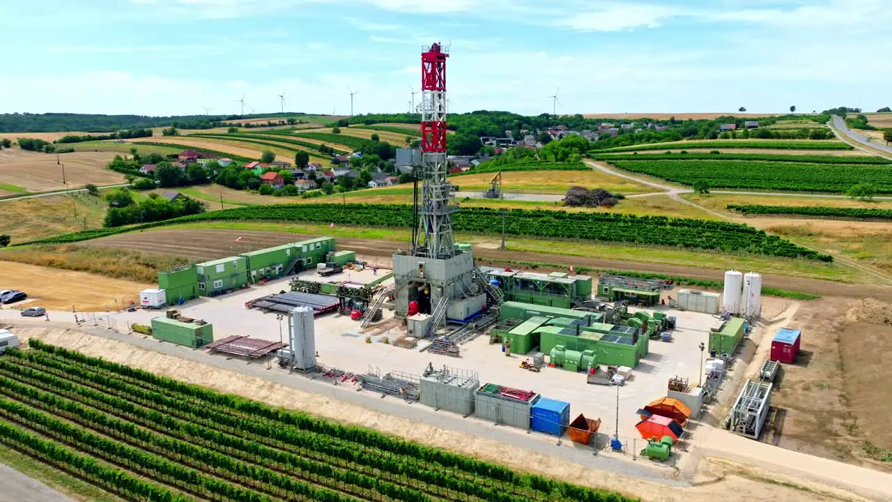 Aerial View Of Natural Gas Oil Drilling Rig On Rolling Hills