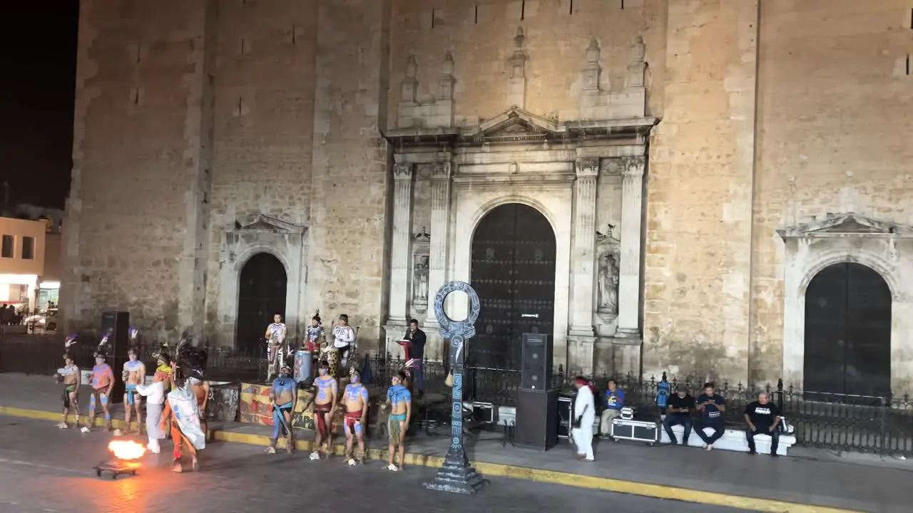 shot of traditional mayan tribal dance in the cathedral of merida yucatan