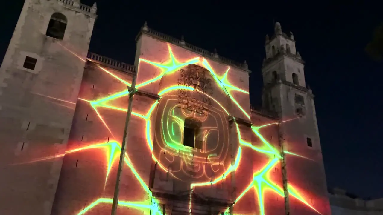 videomapping show with mayan symbols in the cathedral of merida yucatan