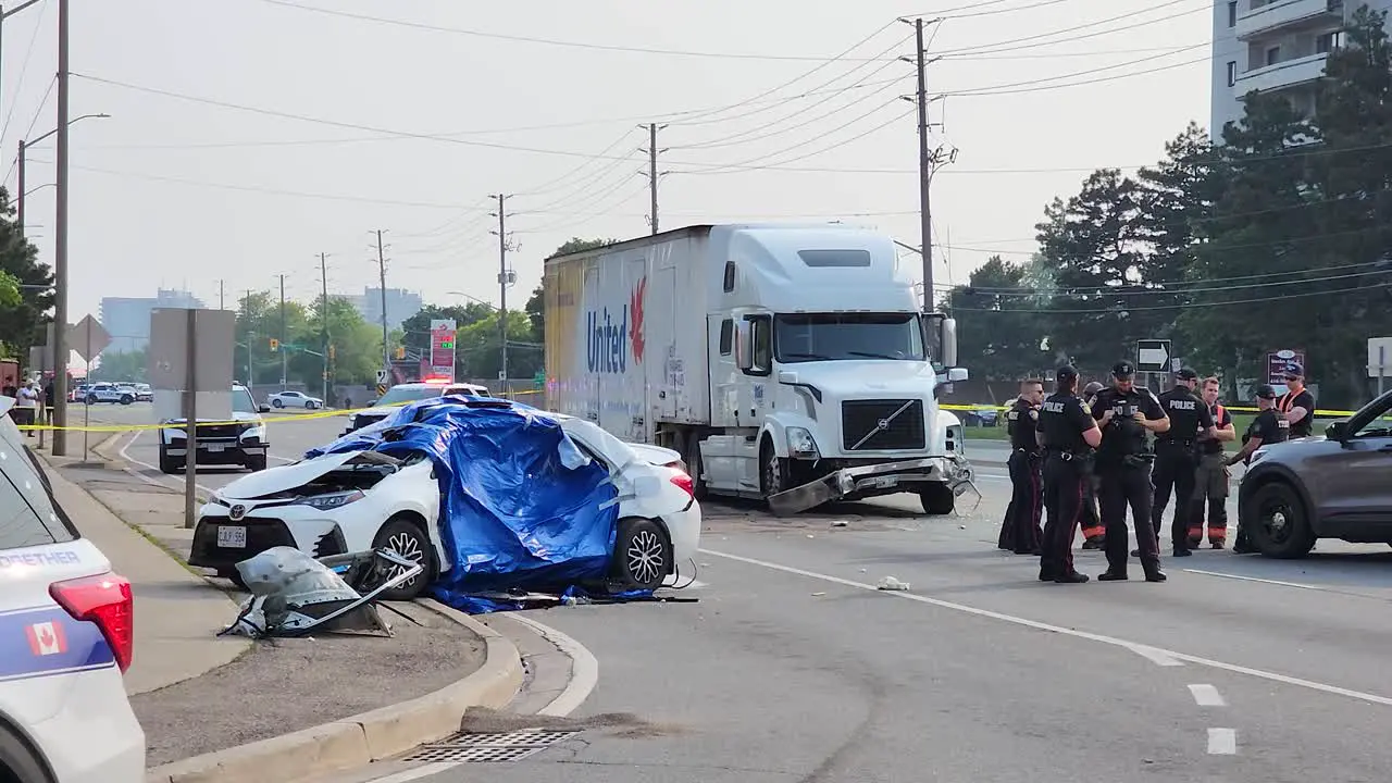 Police Officers At The Scene Of A Car Crash Involving Semi Truck Mississauga Canada