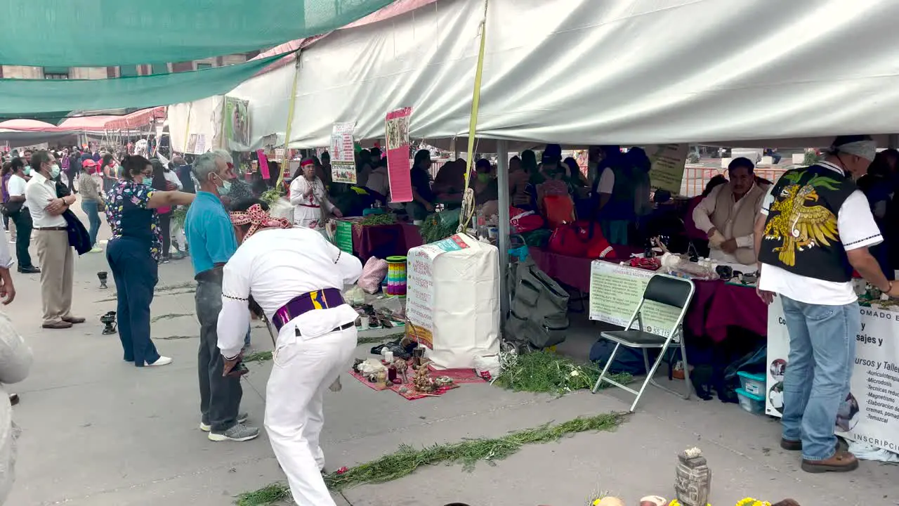 shot of limpia aztec style in the zocalo of mexico city