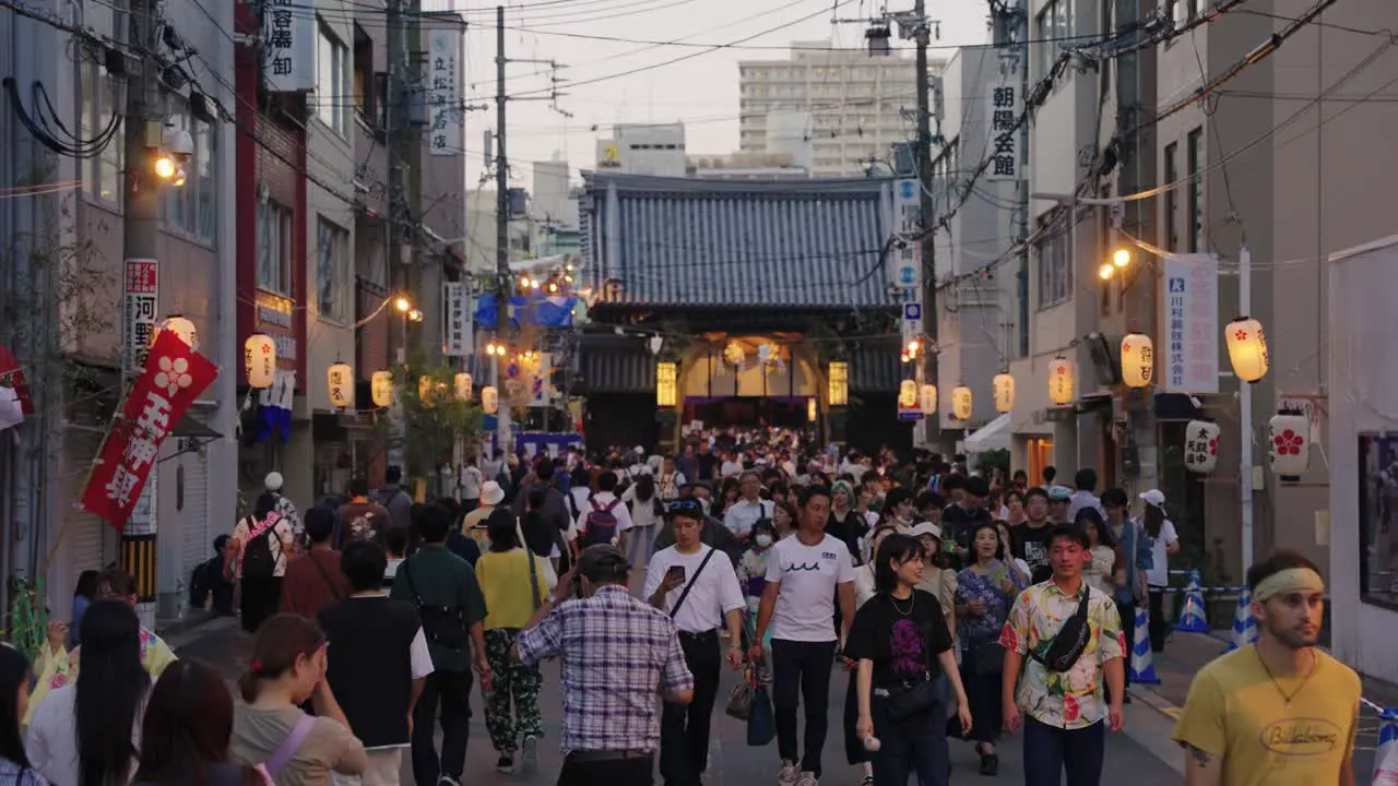 Crowds of Tourists at Tenjin Matsuri Event in Osaka